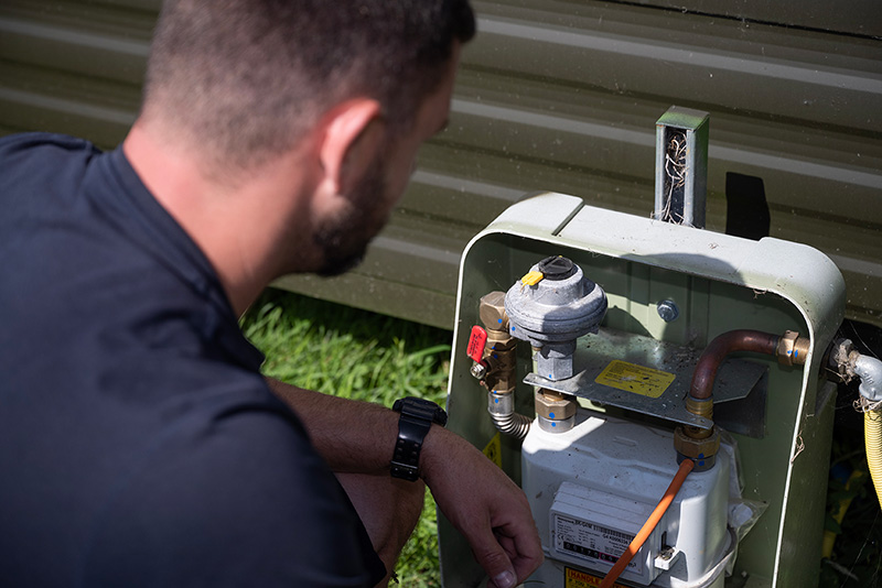 Engineer attending caravan park for boiler servicing