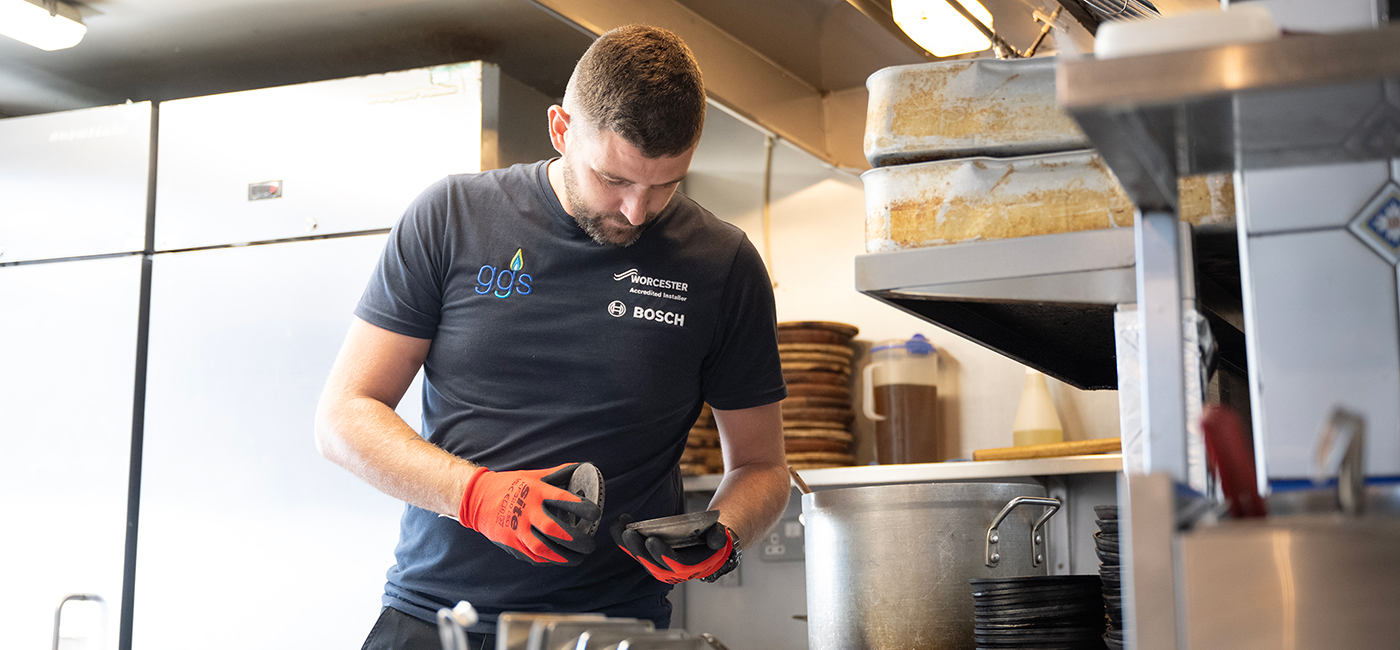 ggs engineer servicing some catering equipment